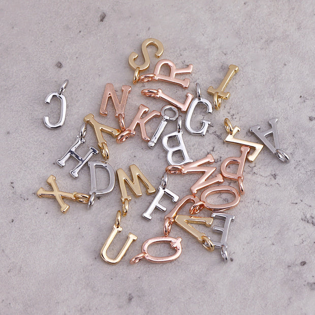 26pcs One set 9X11mm brass initial tags hollow english letter charms